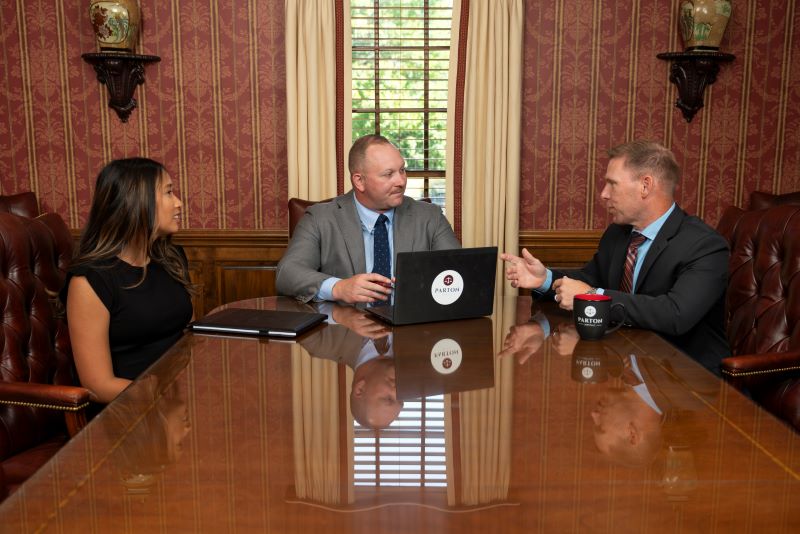 Attorneys sitting at a conference room table